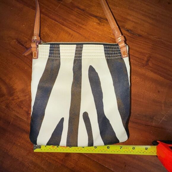 Dooney and Bourke Small Triple Zip Zebra Print Crossbody Bag
EUC - Picture 5 of 9